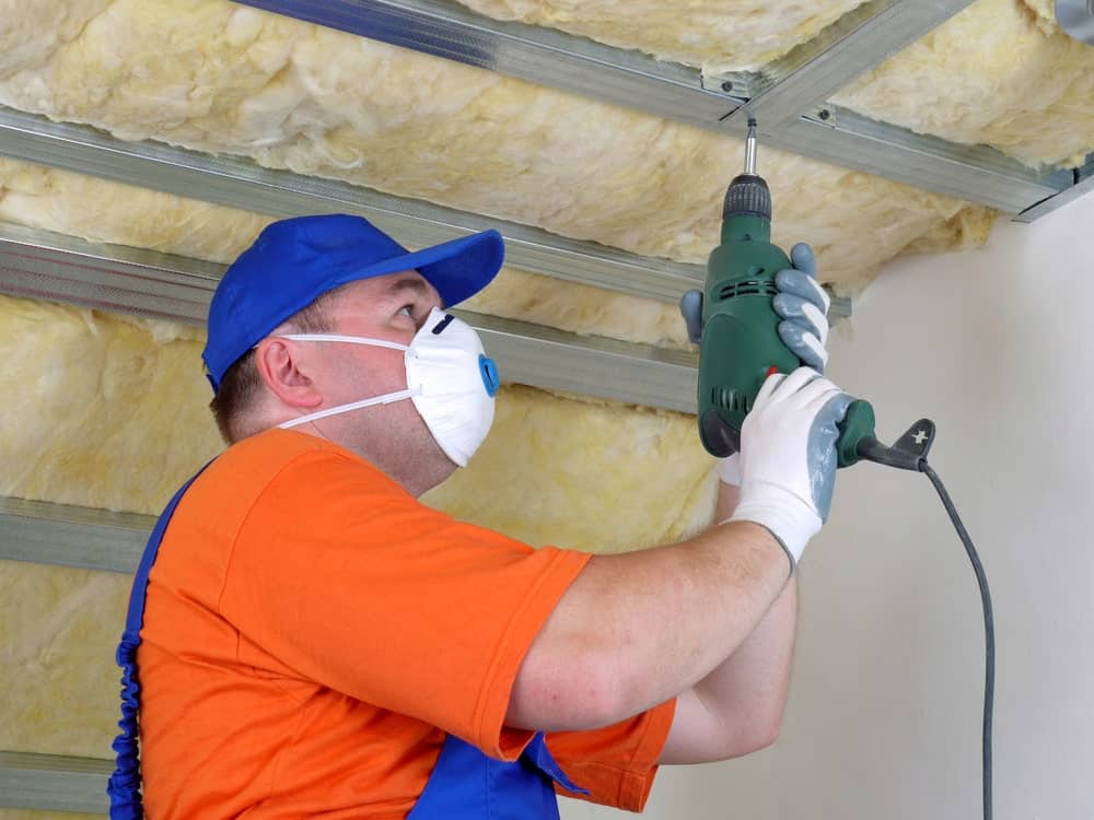 Professional ceiling insulation installation for optimal thermal efficiency.
