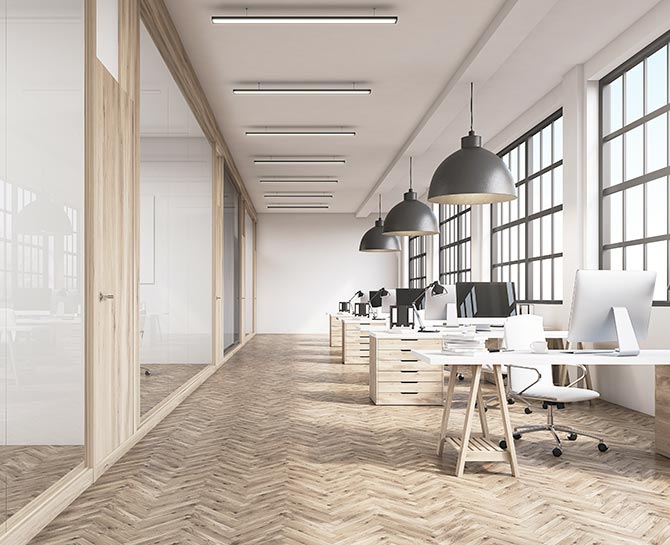 Modern office with stylish Heron ceilings and lighting.