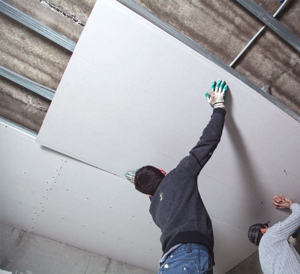 Highly skilled professionals installing ceilings with precision in Australia.