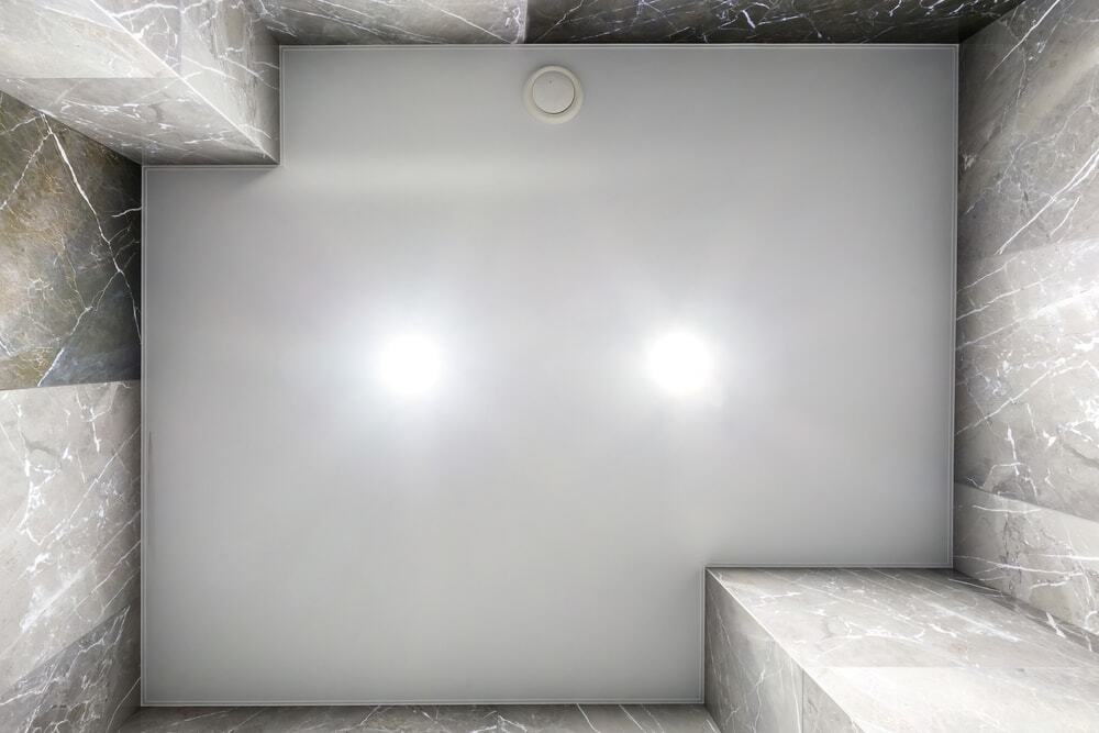 High-quality ceiling installation with elegant marble wall accents for sophisticated interiors.